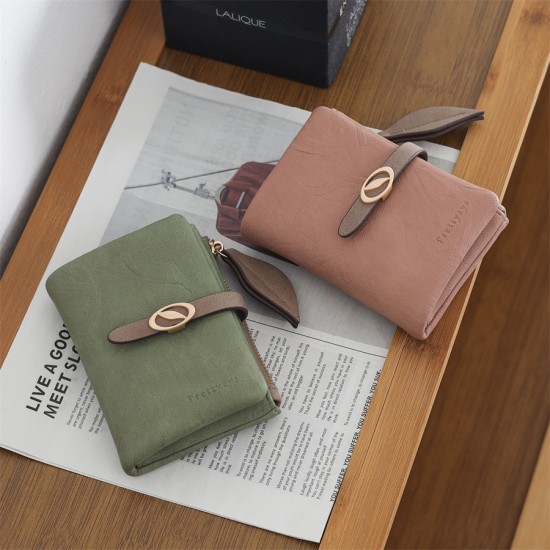 New women's short wallet, European and American style, simple, PU zippered and clasp, foldable clutch, student coin purse wholesale. New women's short wallet, European and American style, simple, PU zippered and clasp, foldable clutch, student coin purse wholesale.