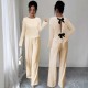Women's suit with a hollowed-out bow at the back, 2025 summer elegant round-neck long-sleeved top and trousers, two-piece set. Women's suit with a hollowed-out bow at the back, 2025 summer elegant round-neck long-sleeved top and trousers, two-piece set.