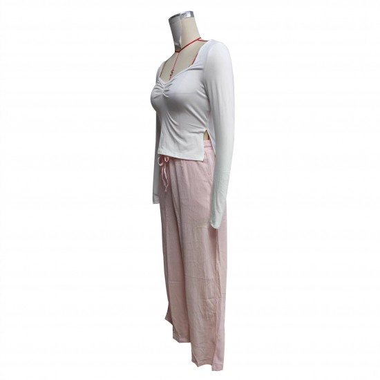 Women's suit: New solid color square-neck, long-sleeved, gathered, side-slit top, T-shirt, women's casual two-piece trousers. Women's suit: New solid color square-neck, long-sleeved, gathered, side-slit top, T-shirt, women's casual two-piece trousers.