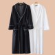 New autumn and winter coral fleece pajamas for men and women, thickened fleece couple's nightgown with pants for winter warmth. New autumn and winter coral fleece pajamas for men and women, thickened fleece couple's nightgown with pants for winter warmth.