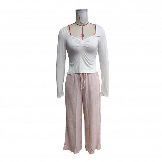 Women's suit: New solid color square-neck, long-sleeved, gathered, side-slit top, T-shirt, women's casual two-piece trousers. Women's suit: New solid color square-neck, long-sleeved, gathered, side-slit top, T-shirt, women's casual two-piece trousers.