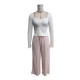 Women's suit: New solid color square-neck, long-sleeved, gathered, side-slit top, T-shirt, women's casual two-piece trousers. Women's suit: New solid color square-neck, long-sleeved, gathered, side-slit top, T-shirt, women's casual two-piece trousers.